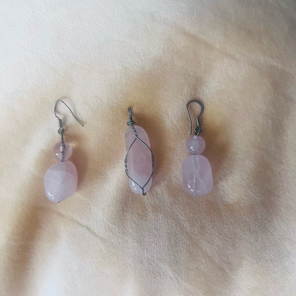 Light pink stone earrings with pendant.